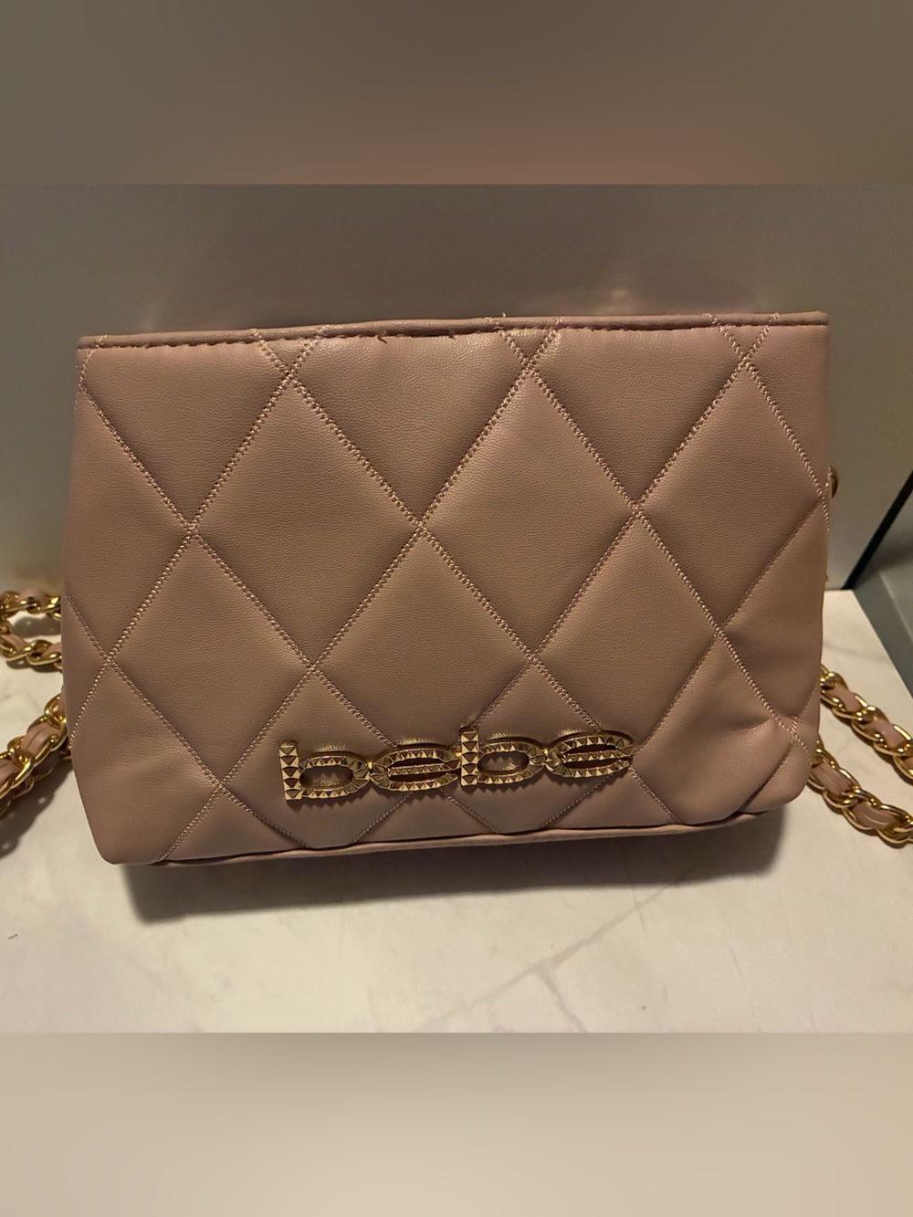 bebe Quilted Crossbody Bag in Blush